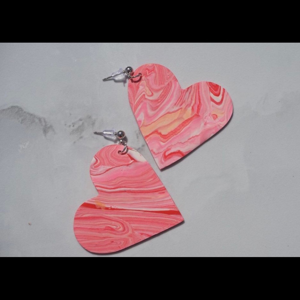 Tongue tied Clay Earrings